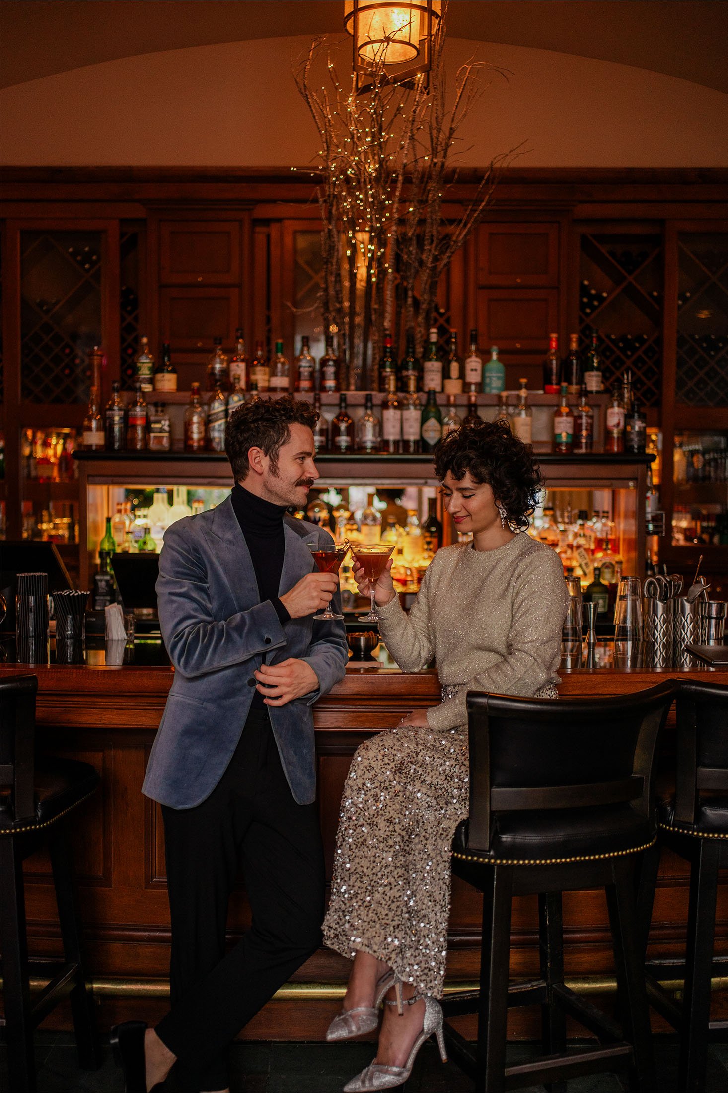 mallard lounge couple cheering in formal attire