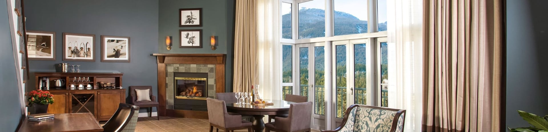 living room with fireplace and large window