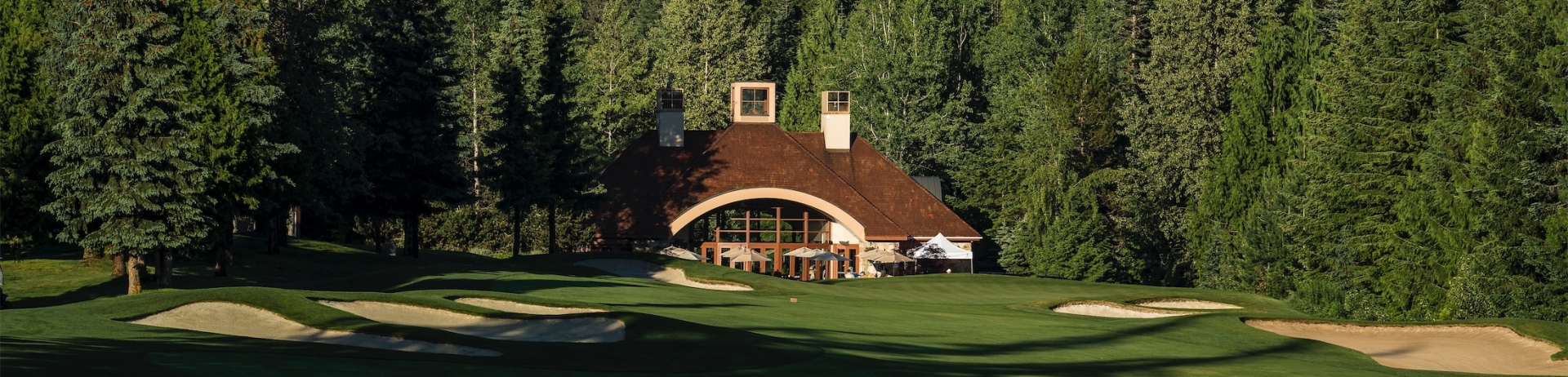 golf course with the clubhouse in the background