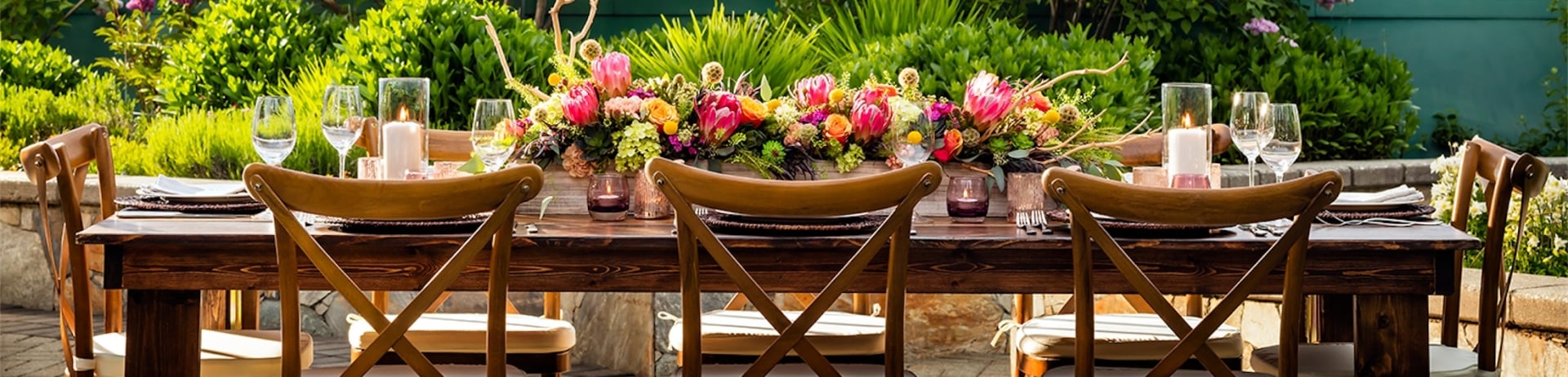 outdoor restaurant seating with snowy mountains