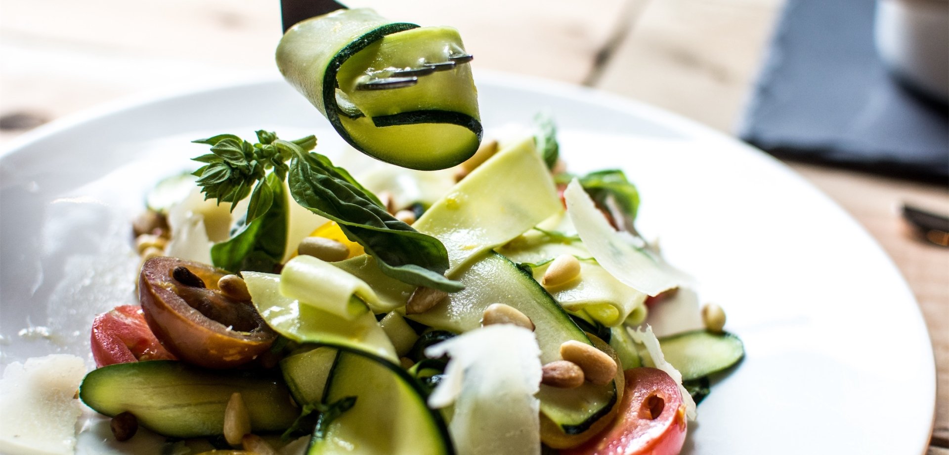 someone eating cucumber salad