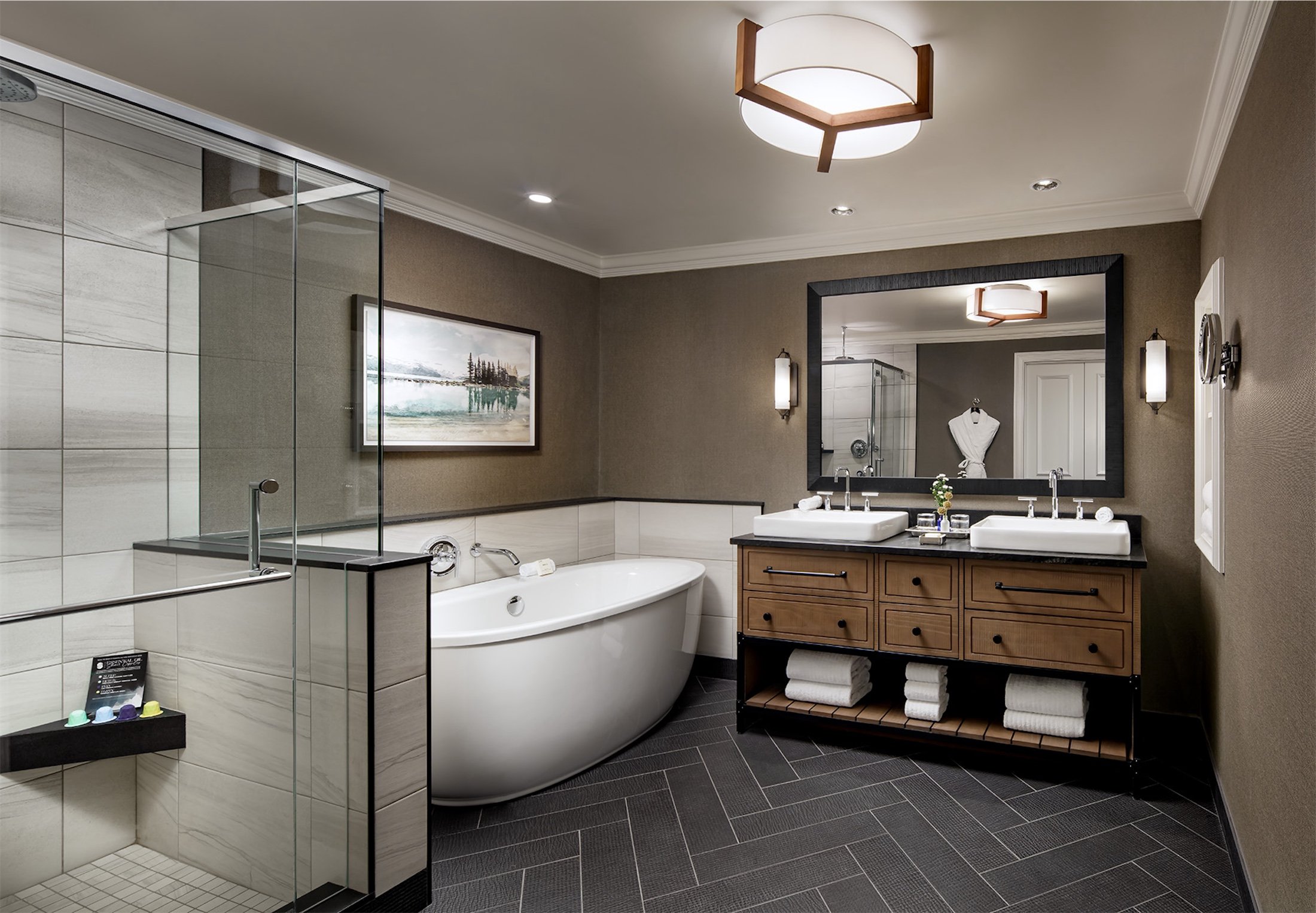 large bathroom with tub and walk-in shower