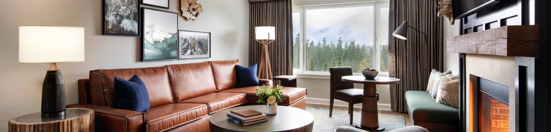 large living room with sectional and fireplace