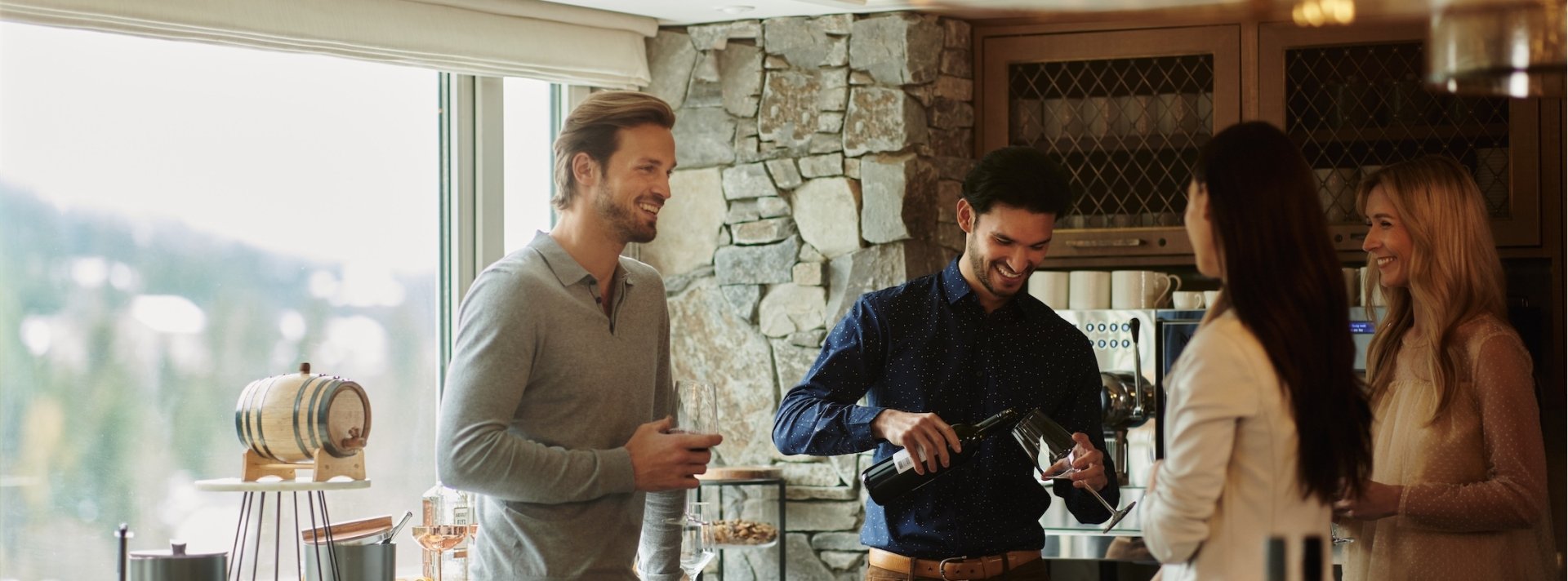 group of friends drinking wine in the lounge