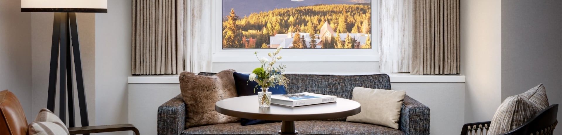 living room with small window overlooking the property