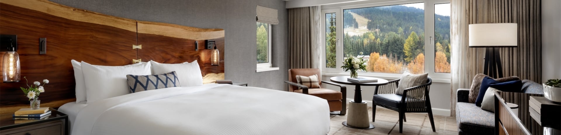 bedroom with small table and sofa