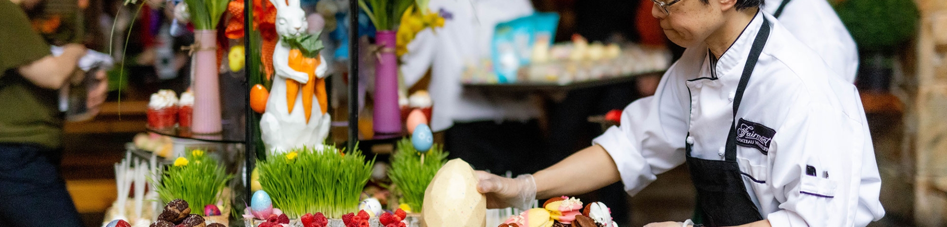 chef prepparing an Easter table dessert spread