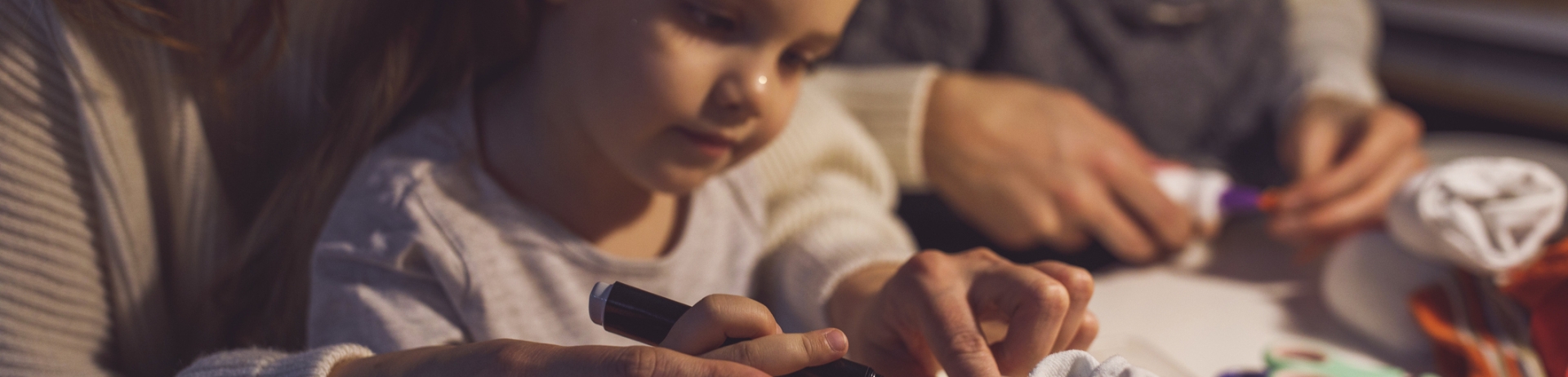 Mother and daughter making a snowman craft
