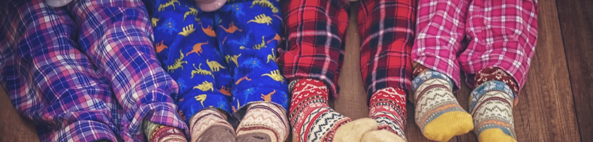 Cute Little Kids in Pajamas and Christmas Socks Drinking Hot Chocolate with Marshmallows for Christmas