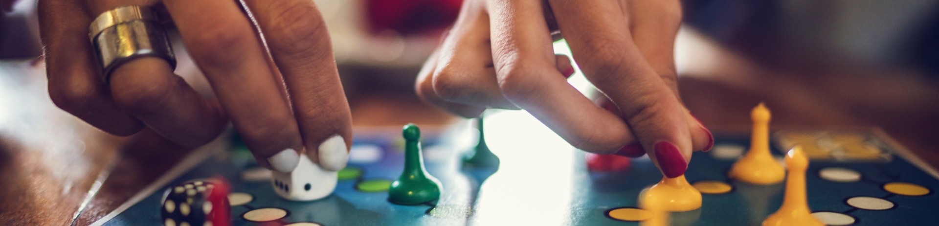 Close up of people playing cross and circle game.