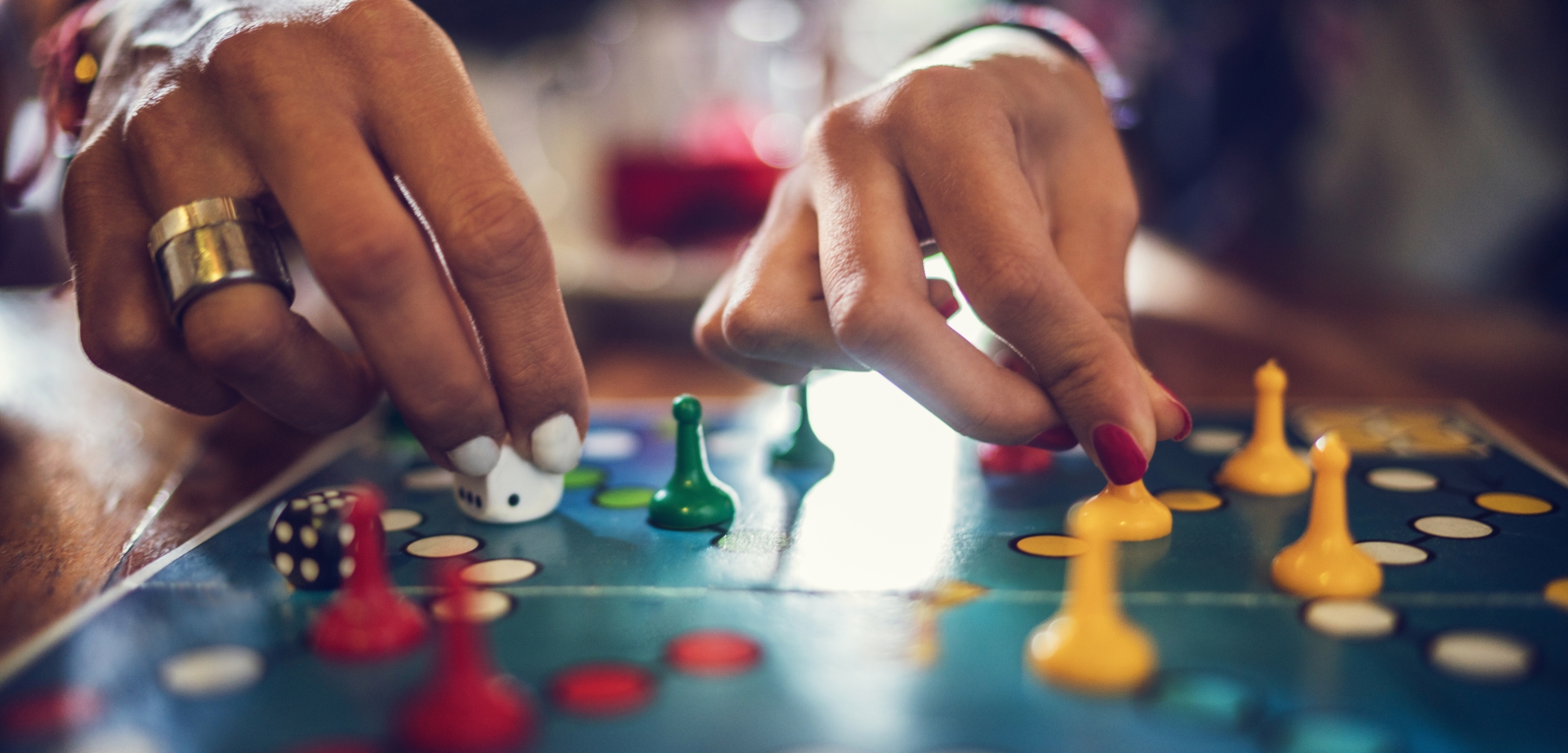 Close up of people playing cross and circle game.