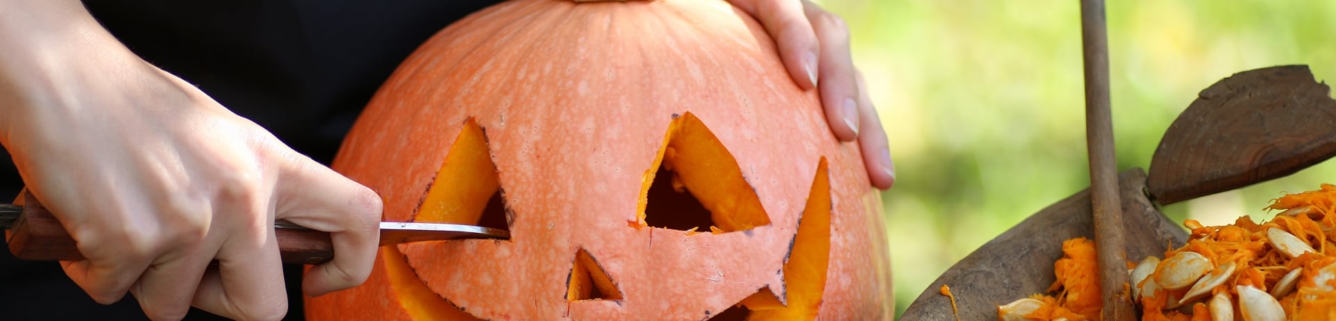 Head carved from pumpkin and monster on holiday