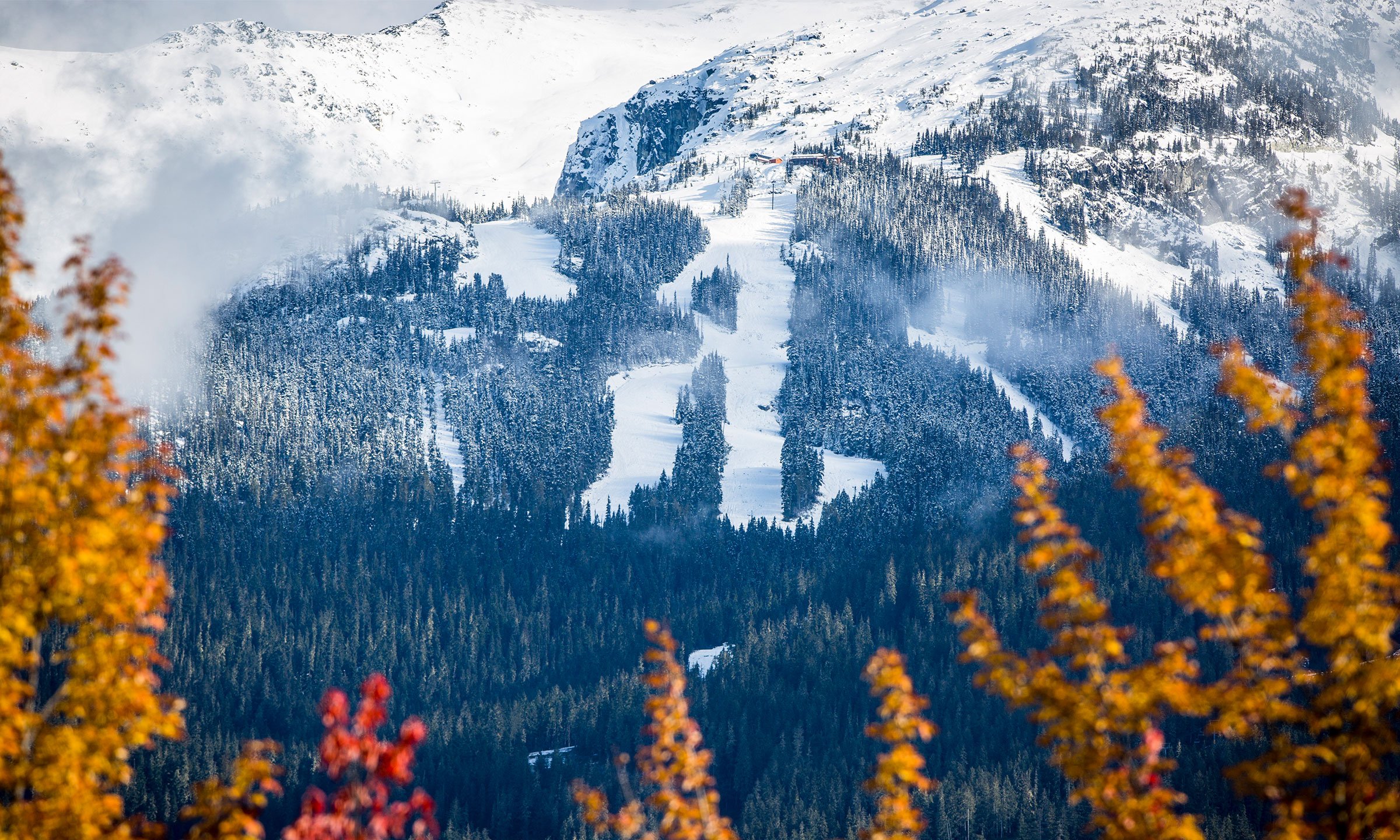 Whistler Fall mountain leaves and snowy ski slopes