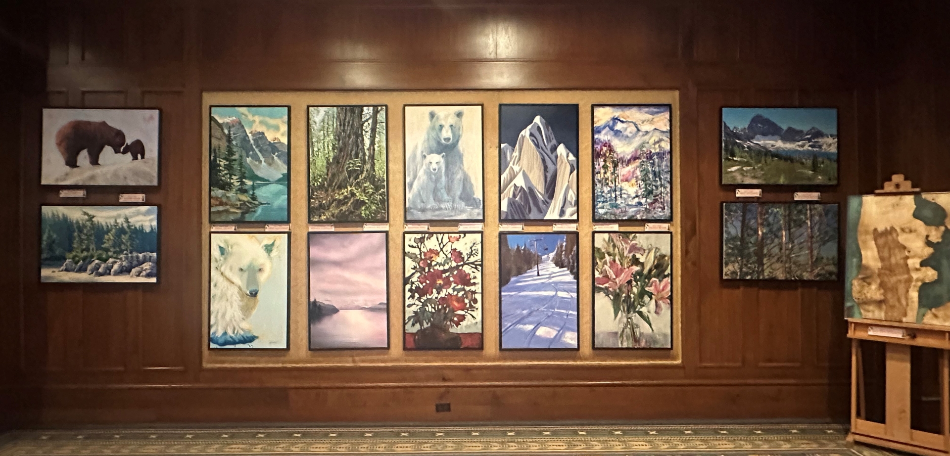 trees of hope art display at fairmont chateau whistler lobby