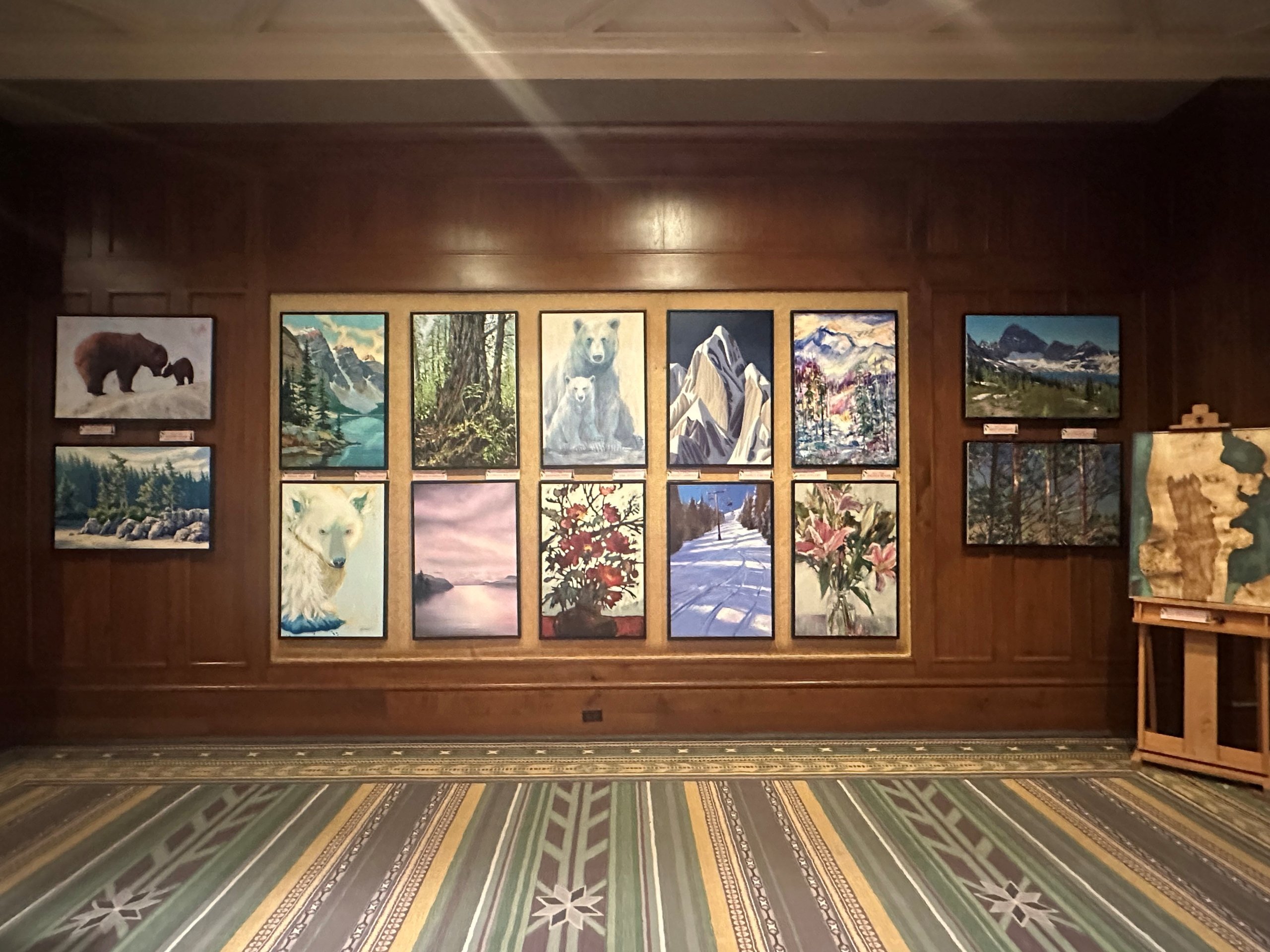 trees of hope art display at fairmont chateau whistler lobby