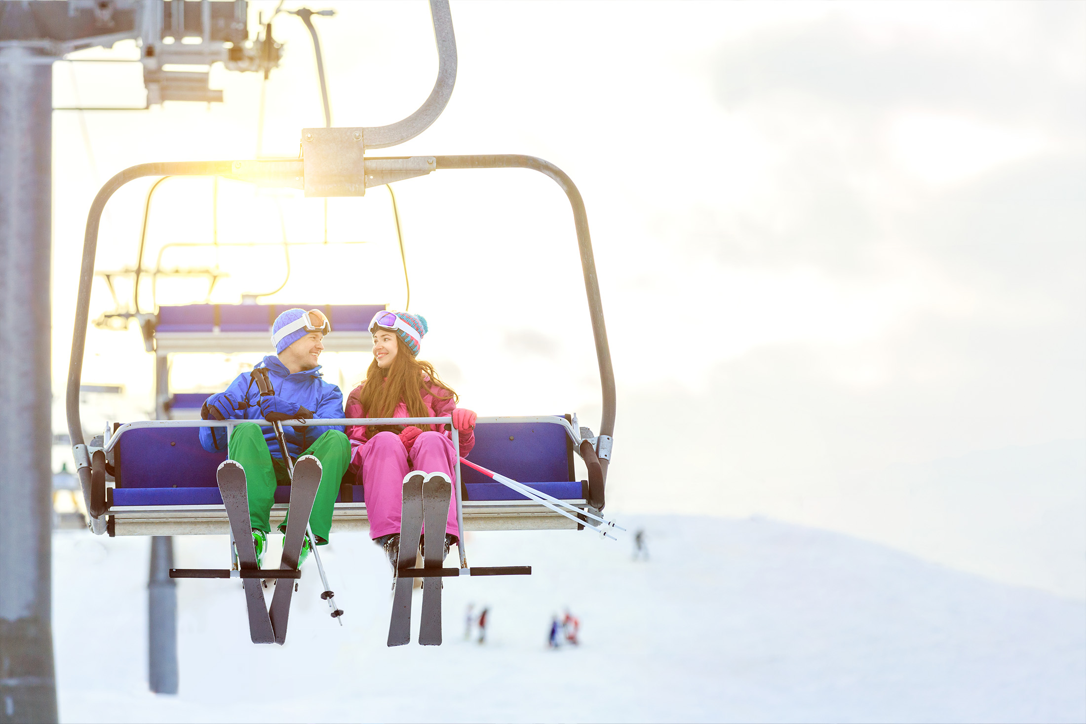Couple on a ski lift.
