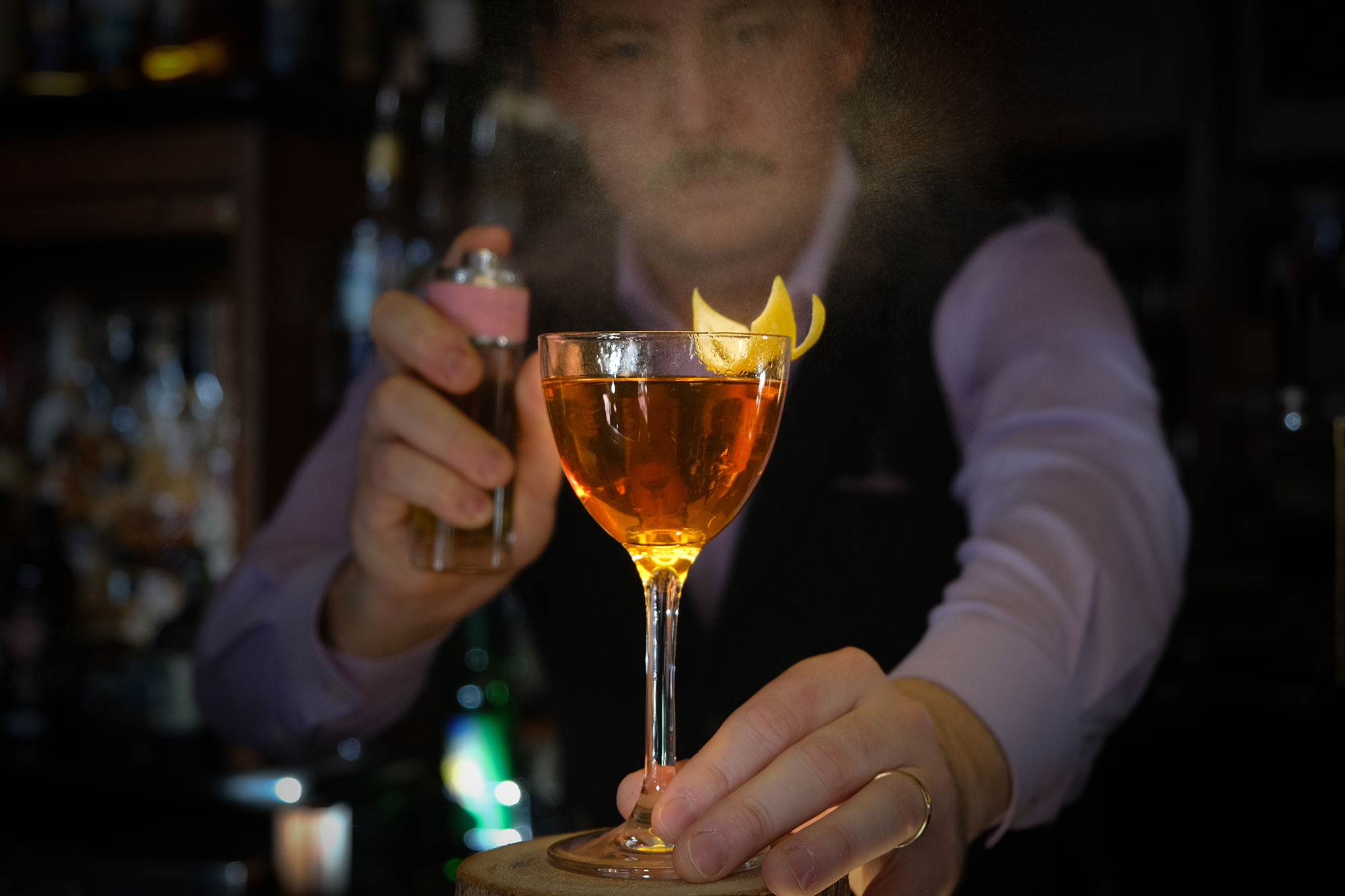 bartender crafting cocktail at the mallard lounge bar