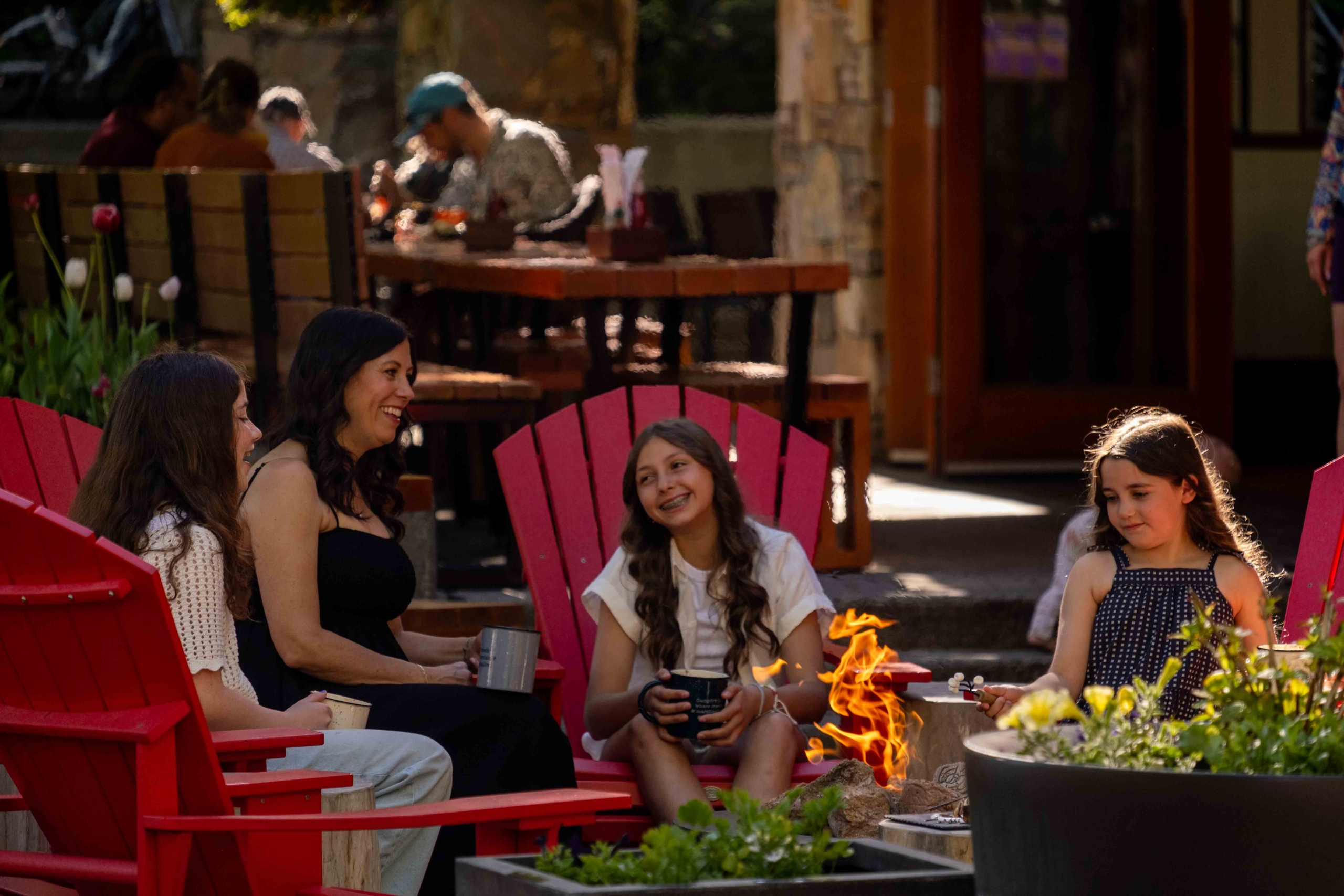 Camp Fairmont family around the fire portobello fire pit