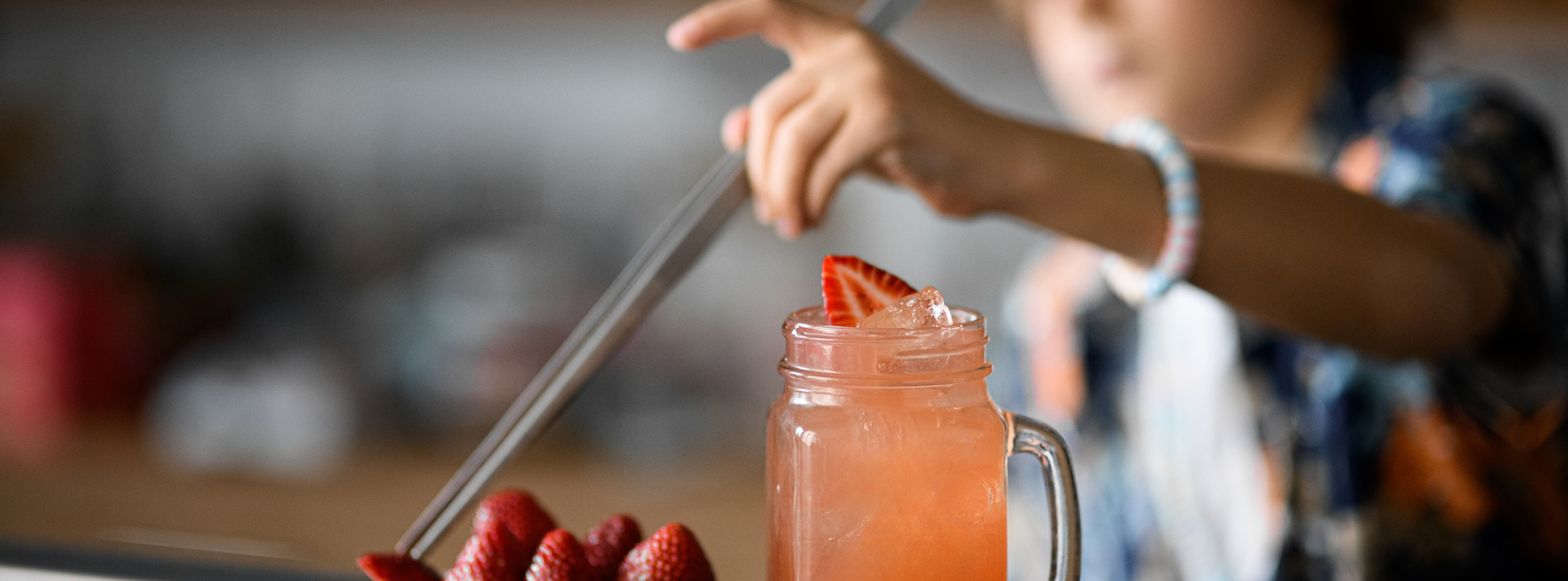 kid making an alcohol free beverage