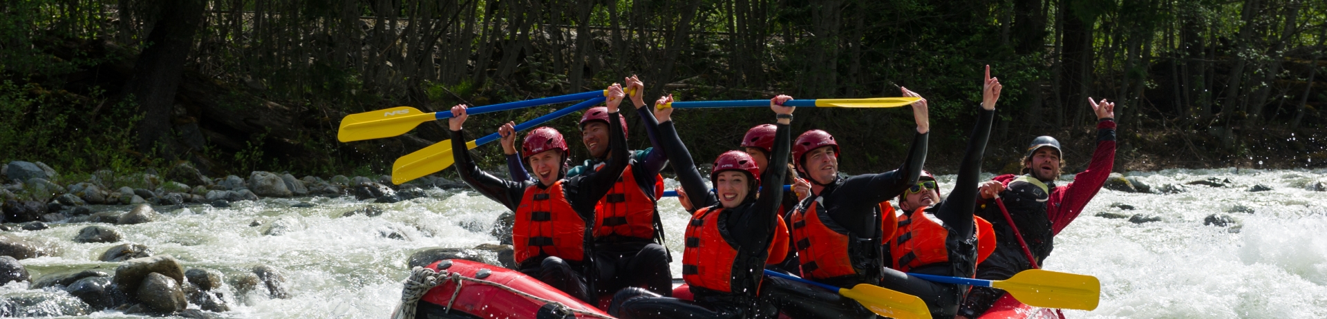 People rafting down Green River