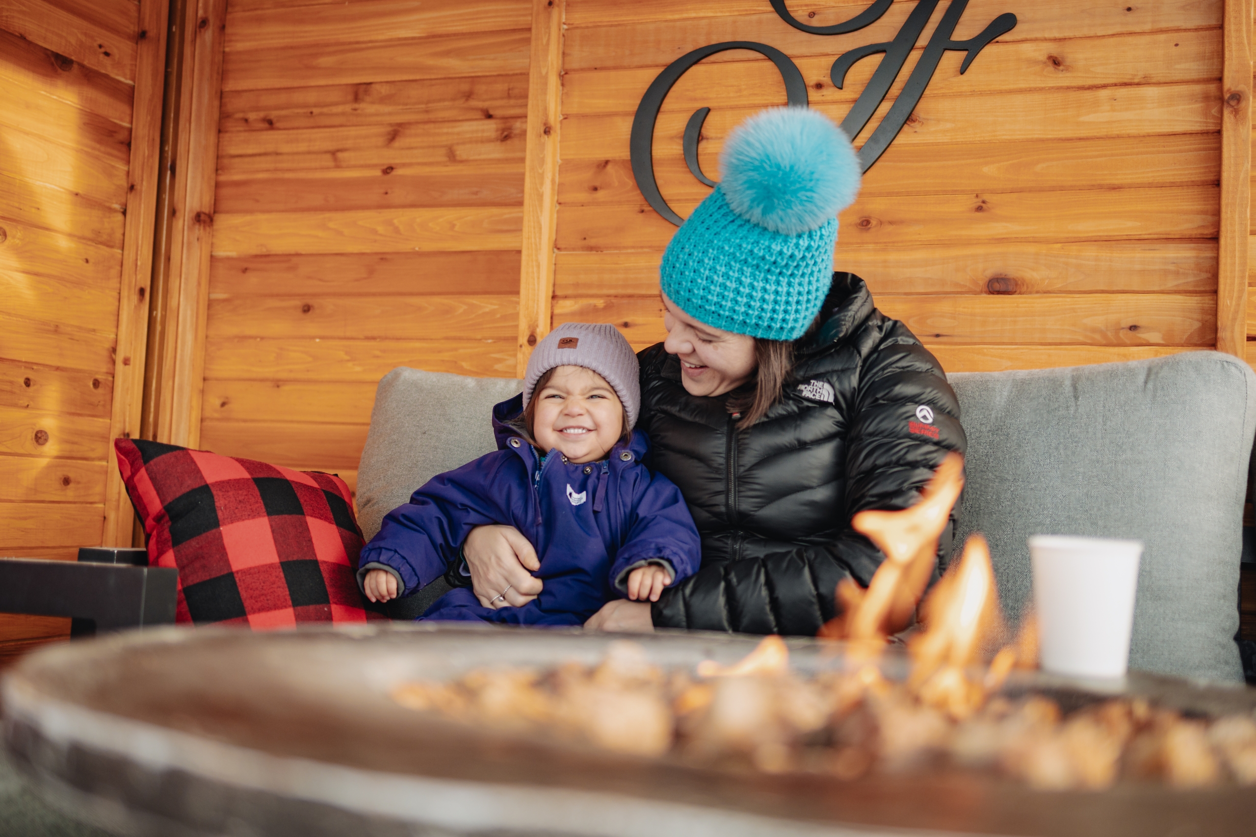 mom and kid at ski valet at fairmont chateau whistler