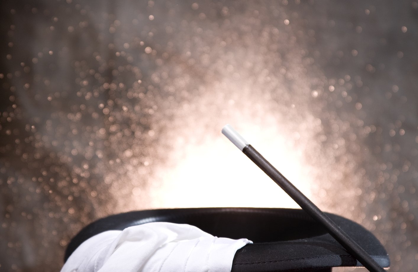 Cards, top hat, magic wand and sparks Fairmont Chateau Whistler event